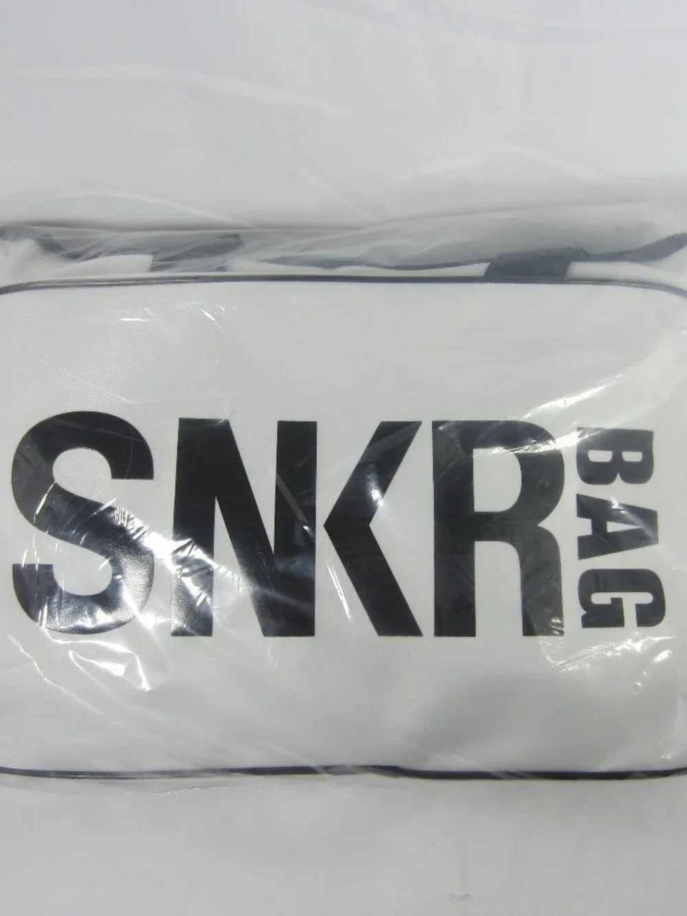 NEW-NEVER OPENED! WHITE SNKR BAG